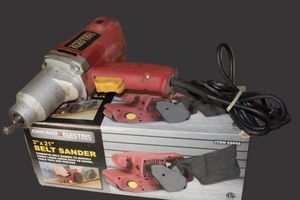 lot 216 image: Chicago Electric Belt Sander 3x21 and 12 Impact Wrench