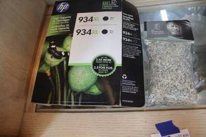 lot 35 image: hp ink 934 xl and shredded money