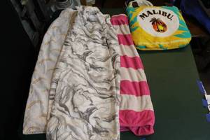 lot 68 image: 3 towel wraps and towel that folds to and bag