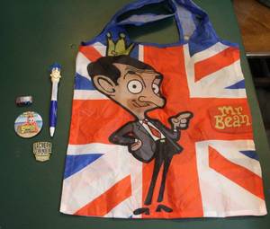 lot 72 image: Mr bean bag and a green bay packers pin a Spongebob movie pin