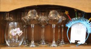 lot 76 image: 12 wine glasses and one birthday wine glass without stem and a birthday headband