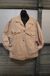 lot 81 image: LG Made in Malaysia jacket with some art work done on it a few holes in it see pictures