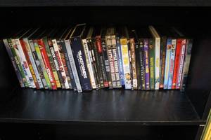 lot 115 image: DVD lot a few titles like Deadpool  frozen  transformers looney tunes and many more