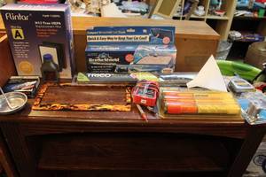 lot 116 image: Car lot metal flamed license plate cover filter sun visor spark plugs flares tape measure and more see pictures