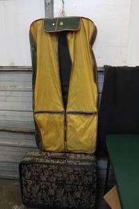lot 129 image: Suitcase and garment bag