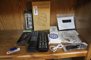 lot 147 image: Knee brace and chargers keychain stylus pen and more see pictures