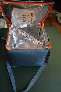 lot 176 image: Small cooler with two dividers inside as seen in picture