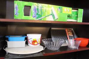 lot 179 image: Swiffer sweeper  pizza stone cutting board and more see pictures