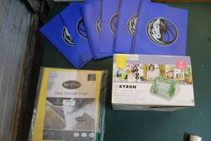 lot 225 image: Six plastic Mavericks folders and heat transfer vinyl and xyron 5 creative station