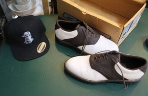 lot 229 image: Cap and Reebok golf shoes size 9 12m