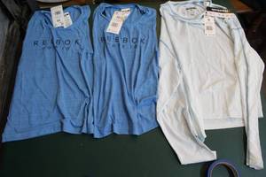 lot 231 image: 3 Reebok womens shirt two extra small and one medium