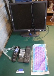 lot 254 image: Dell computer monitor and remotes and more see pic.