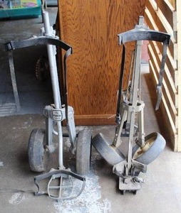 lot 265 image: two golf caddie carts one is Spartan by browning mand in U.S.A.