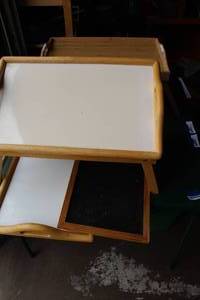 lot 268 image: lap tables one lefts to do work on 2 of them have feet one is just a tray and a chalkboard