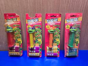 lot 24 image: Lot of 4 Vintage Teenage Mutant Ninja Turtles PEZ Dispensers