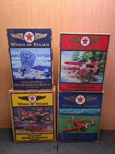 lot 61 image: Lot of 4 Texaco Wings of Texaco Diecast Planes.  Number 7, 8, 9 & 12