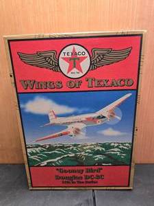 lot 62 image: Texaco Wings of Texaco #11 Gooney Bird Diecast Plane