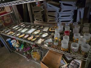 lot 103 image: Contents of Shelf.  MASSIVE Lot of Leaded Picture Frames and Candle Holders.  Includes Everything on Middle Shelf.