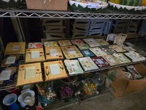 lot 104 image: Contents of Shelf.  MASSIVE Lot of Picture Frames.  Includes Everything on Middle Shelf.