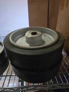 lot 270 image: Lot of 2 10x6 Steel Mold-On Rubber Wheels