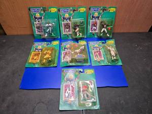lot 313 image: Lot of 7 2000-2001 Starting Lineup Football Figures on Card