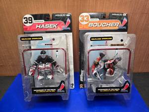 lot 320 image: Lot of 2 McFarlane Toys NHL Goalie Figures.  Hasek & Boucher.  These are really cool
