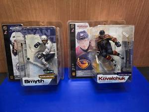 lot 321 image: Lot of 2 McFarlane Toys NHL SportsPicks X Figures.  So much detail on these