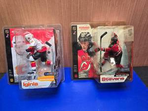 lot 322 image: Lot of 2 McFarlane Toys NHL SportsPicks X Figures.  So much detail on these