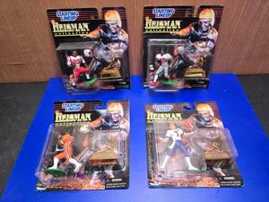 lot 323 image: Lot of 4 1997 Starting Lineup Heisman Collection NFL Figures On Card