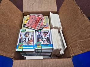 lot 423 image: Box FULL of Cards.  Includes 1990 Topps NFL, 1987 Topps Baseball & 2007 Topps NFL