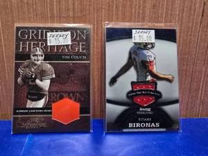 lot 429 image: Lot of 2 Cards w Inserts.  Tim Couch Helmet & Rob Bironas Pro Bowl Jersey