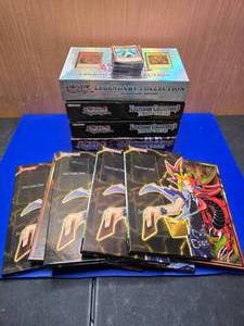 lot 442 image: Lot of Yu-Gi Oh.  Includes Boxes, Play Mats & Cards