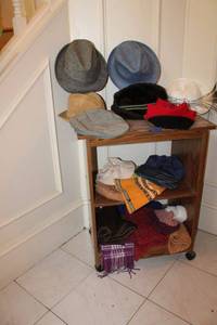 lot 10 image: Mens hat and scarf collection with rolling cart