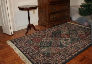 lot 14 image: Area rug (navy  311 x 510) with small round side table