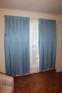 lot 18 image: Blue curtains and green curtains