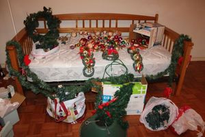 lot 20 image: Christmas decoration assortment with tree stand