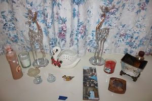 lot 31 image: Home dcor with silver reindeer, candles and more