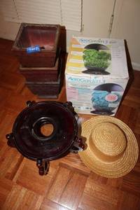 lot 174 image: Aerogarden (unopened kit), planters, wood base, and straw hat