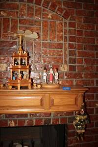 lot 59 image: Knight armor puppet marionette, Romanian doll figurines, and candle pyramid carousel