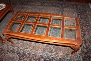 lot 65 image: Coffee table with 10 glass panels