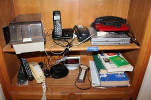 lot 45 image: Home phones, DVD player, and more