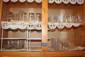 lot 94 image: Juice glassware and cabinet organizers