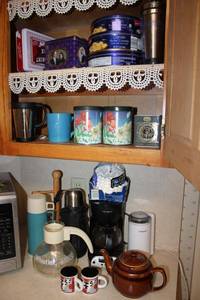 lot 98 image: Tins, coffee maker and grinder, teapots and thermos mugs
