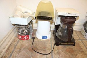 lot 76 image: Vintage coffee maker, popcorn air popper, and cookie cutters