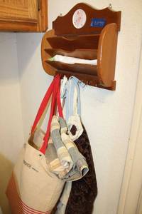 lot 77 image: Wooden wall hanging letter holder and bag