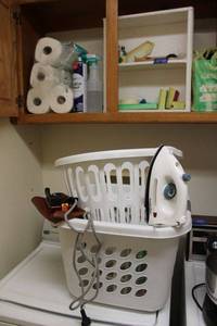 lot 80 image: Laundry baskets, clothing irons, toilet paper and more