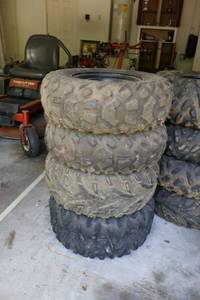 lot 145 image: Tires Goodyear- 25x8.00-12NHS, Dunlop KT415, Bighorn AT25x10-12