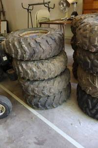 lot 146 image: Tires Bridgestone, Dirt Hooks AT24x9-11, AT24x8-12