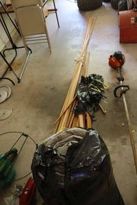 lot 152 image: Roll of Comfort Therm insulation and Wood trim pieces