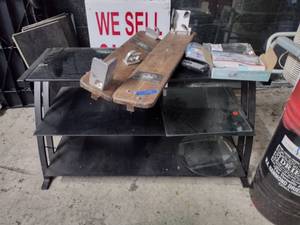lot 202 image: Table with glass top shelves plus contents